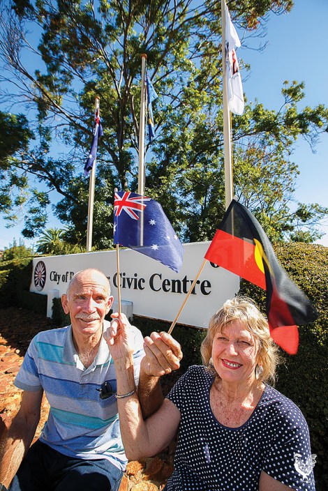 • Jan Wheare and Roger Tomlins want the Aboriginal and Torrest Strait Islander flag flying every day. Photo by Matthew Dwyer