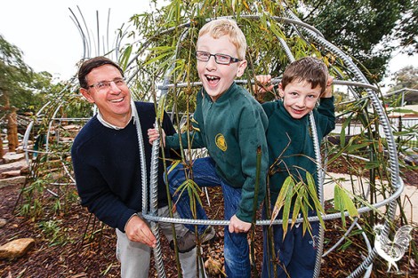 • Coolbinia Primary School’s P&C president Nigel Dennis, 50, of Menora, with his children, Toby, 8, Ethan, 6, at Braithwaite Park’s nature play area in Mount Hawthorn. Photo by Matthew Dwyer