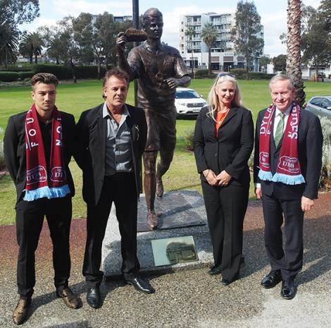 • Taylor, Jim and Tracy Tombides with premier Colin Barnett beside the statue of the late Dylan Tombides. Photo supplied | Garrick Garvey