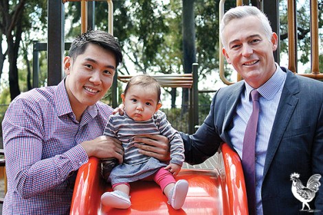 • Vincent council candidate Anthony Fisk (right), partner Joseph and their daughter Celeste Rose. Photo by Matthew Dwyer
