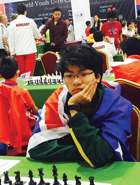 • Patrick Gong studies his next move. Photo supplied