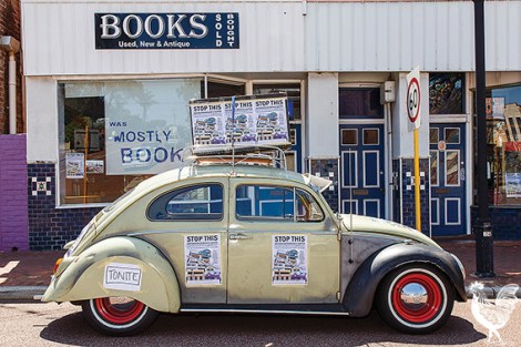 • Keith Clements’ poster-covered VW Beetle is a familiar sight around Bayswater. It’s pictured here just down the street from buildings he’s trying to save. 