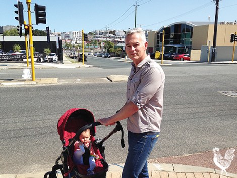 • Vincent council candidate Anthony Fisk, with new bub Celeste Rose, wants safer crossings around the city. 
