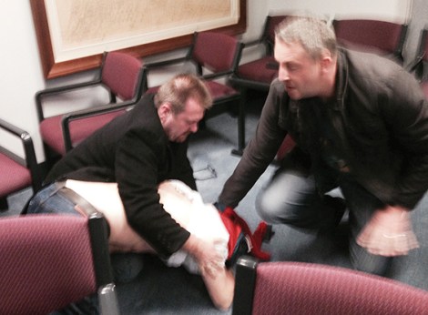 • Stuart Lofthouse moments after the scuffle when two Vincent rangers tried to remove him from the council chambers. Photos by David Bell