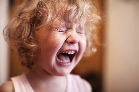 Sad baby. Crying little girl