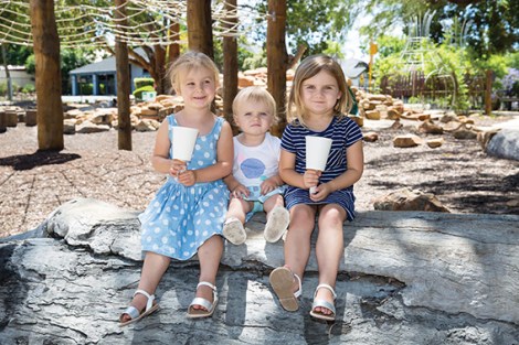 • Local kids Sophie Bolton and Milla and Asha Lemmey with their candles and cups getting ready for the carols at Braithwaite Park. Photo supplied | Scott Jennings