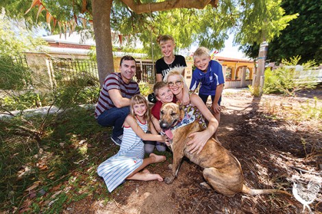 • Vincent mayor John Carey with the Hinsman family at an “adopted” verge in North Perth. Photo by Matthew Dwyer