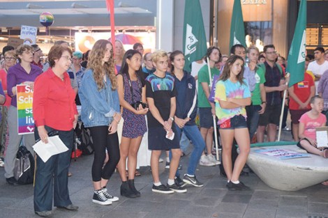 • Attendee at the rally. Photos supplied