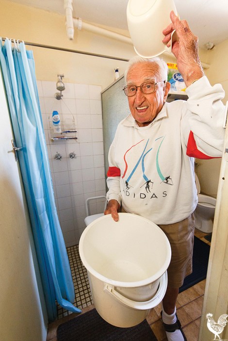 • Jim Grace has been using a bucket to shower for two weeks. Photo by Matthew Dwyer