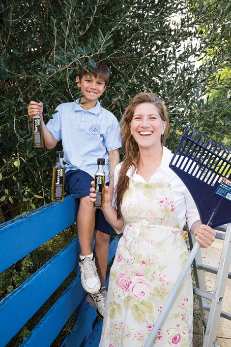 • Ingrid Magtengaard and her son Will preparing for the big harvest.