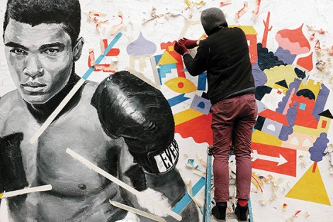 • Brolga at work on his Muhammad Ali portrait.