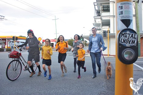 • Regina, Pablo (on his bike seat), Sophie and Jazuli Eccleston-Wirth and Jodie and Mattie Scott negotiate the William/Bulwer intersection, which inexplicably has no little green man. Not good enough, says mayor John Carey, who’s out to get one at a cost of $200,000.