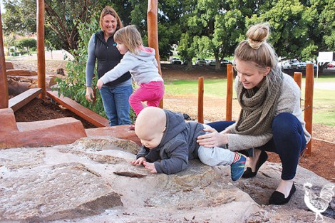 • It’s school holidays and Benjamin Pearce and mum Laura Carpenter, and Emily and Karen Ross were helping to break in Bert Wright Park’s new nature playground. Photo by Steve Grant