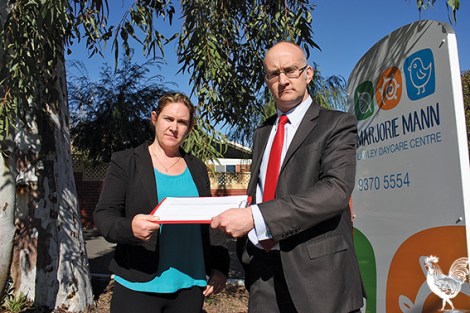 • Simon Millman hands over his petition to Marjorie Mann’s Shelley Carlin.