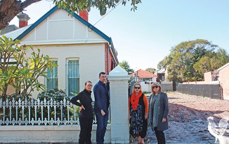 • Mayor John Carey and Harley Street’s Roz Hughes, Janine Wells and Toni Gibbs lament the new gap in their old-style streetscape. They fear it’s a long-term neighbour now. Photo by Steve Grant