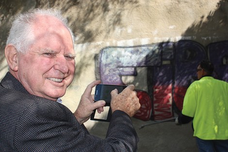 • Bayswater councillor Alan Radford says reporting graffiti with a smartphone app will let Paul Lazaridis and the rest of the maintenance crew get there quick to rub it out.