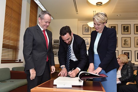 • Tim Hammond gets sworn in as a shadow minister, flanked by Bill Shorten and Tanya Plibersek.