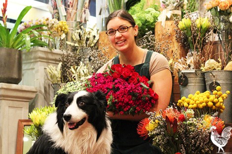 • Stacey Lenstra and shop pooch Bobby run an earth-friendly flower store. Photo by Trilokesh Chanmugan