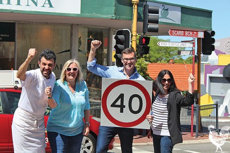 •Mt Hawthorn locals Mario Tolardo, Alex Castle, and Elle Gonzales-Skuja celebrate the implementation of a 40km speed-limit through the town centre with Vincent Mayor John Carey. Photo by Trilokesh Chanmugam