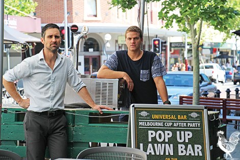 • Universal bar owners Trevor Candido and Jason Juraszek in their alfreso area pop-up for Melbourne Cup. Photo by Steve Grant