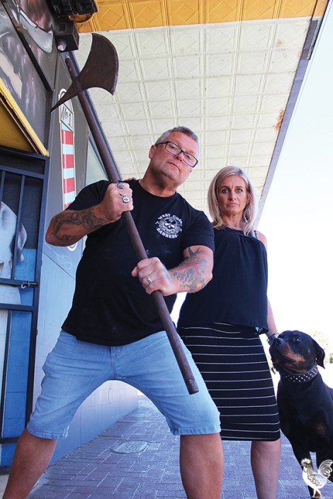 • With The Chop Shop itself facing the axe, barber shop owners Andy and Marianne Bondarenko (with attack dog Boris) say they’ll not stand idly by. Photos by Trilokesh Chanmugam
