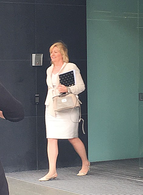 • Lisa Scaffidi leaves the SAT hearing.
